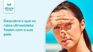 Raios ultravioleta: o que eles fazem com a sua pele? Como podem prejudicar o resultado da cirurgia plástica? Imagem mostrando uma mulher com a mão na cara se cobrindo do sol