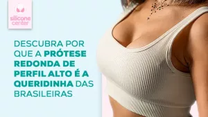 Prótese redonda de perfil alto: quais são as vantagens? Imagem mostrando uma mulher usando um cropped branco que destaca bem os seios
